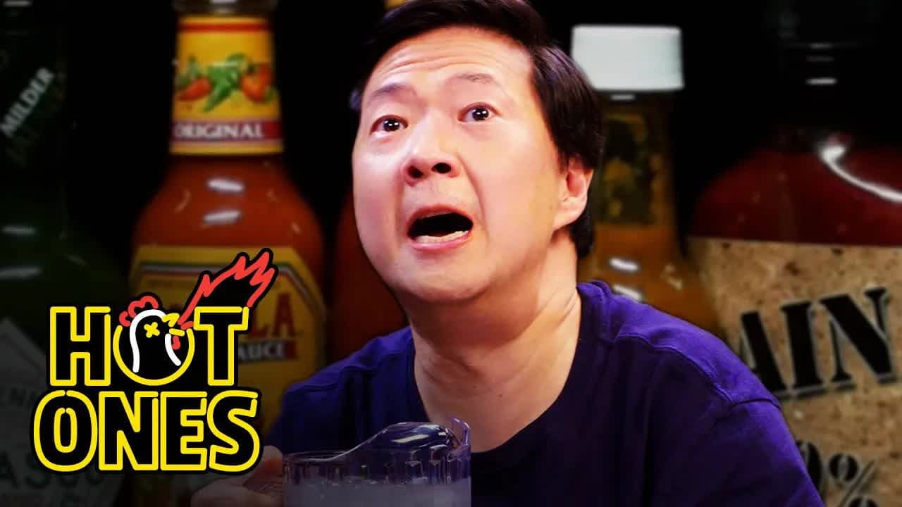Still from Ken Jeong Performs a Physical While Eating Spicy Wings