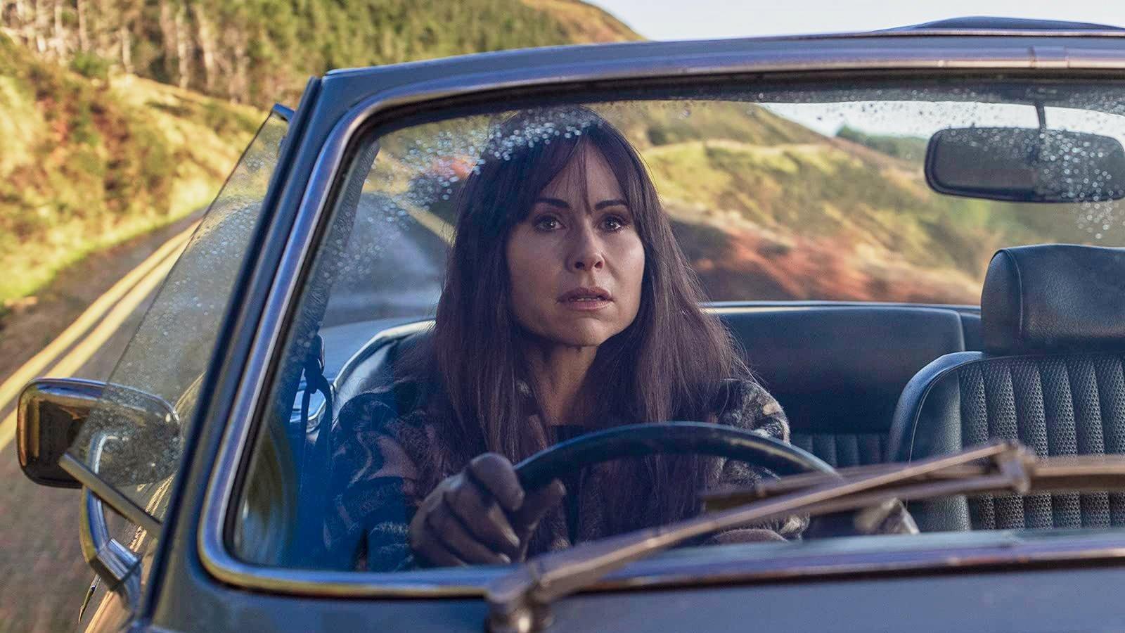 Still from On a Serpentine Road, With the Top Down