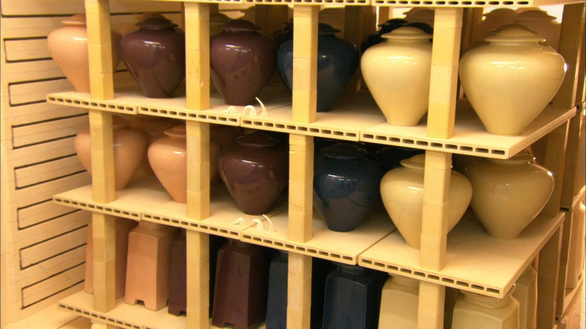 Still from Paper Umbrellas, Coal, Aircraft Seats, Cremation Urns