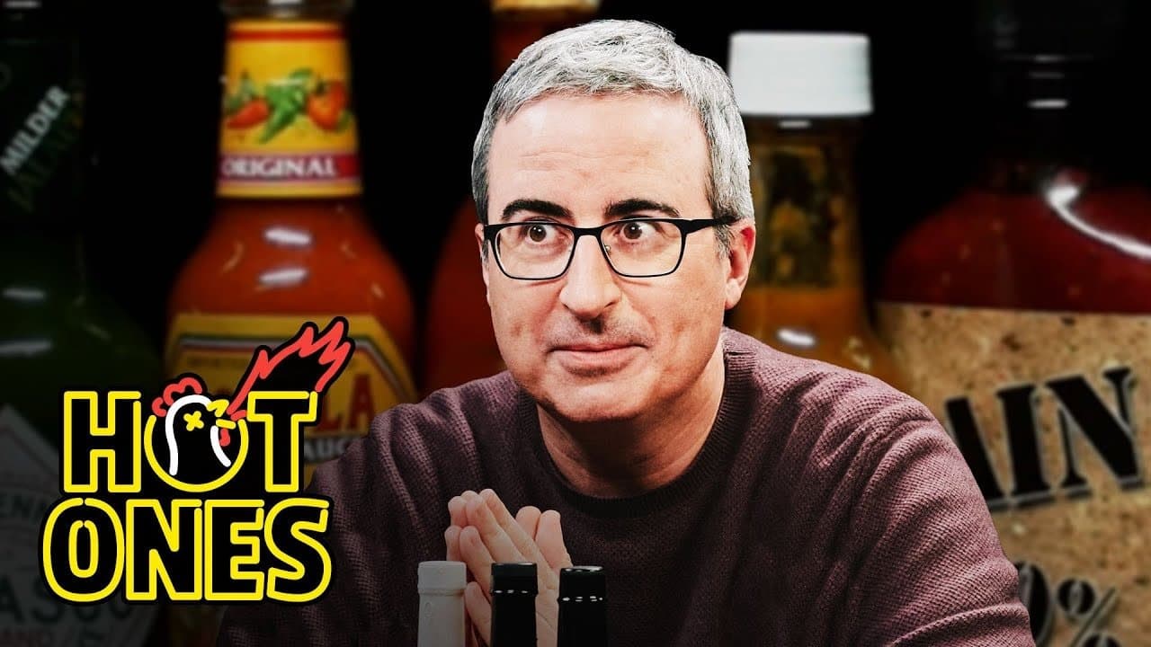Still from John Oliver Fears for Humanity While Eating Spicy Wings