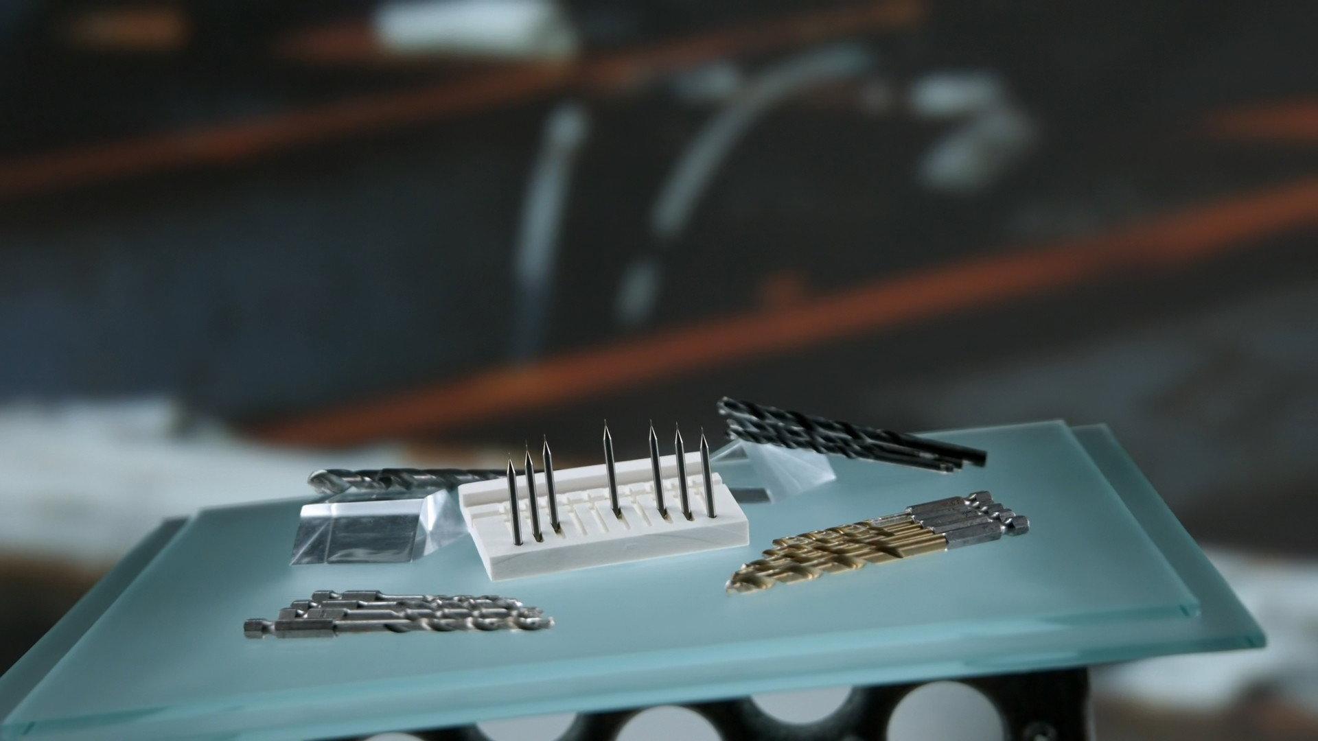 Still from Compression & Extension Springs, Micro Drill Bits, Skiffs, Painted Glass Backsplashes