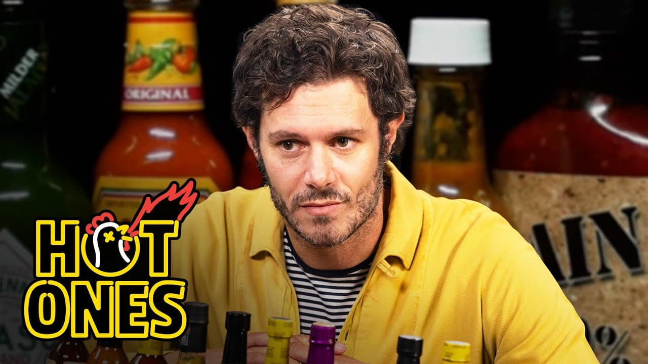 Still from Adam Brody Surfs Through the Pain While Eating Spicy Wings