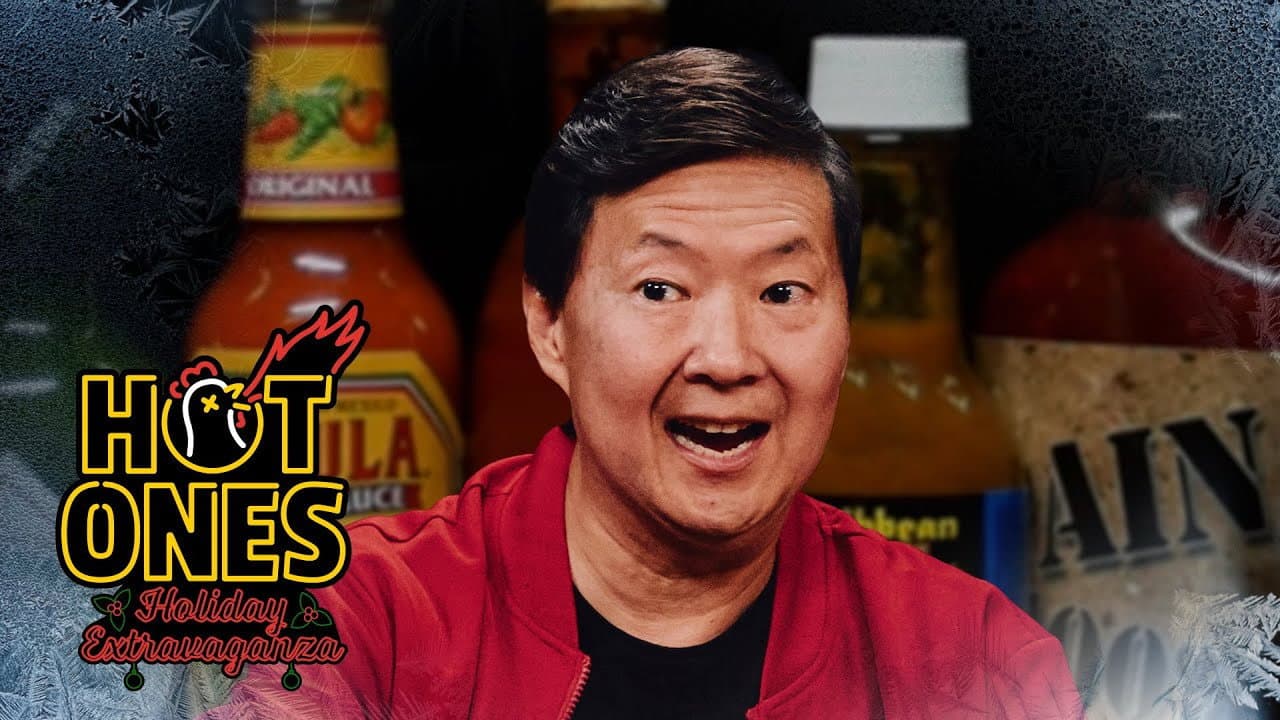 Still from Ken Jeong Spreads Joy at the Hot Ones Holiday Extravaganza