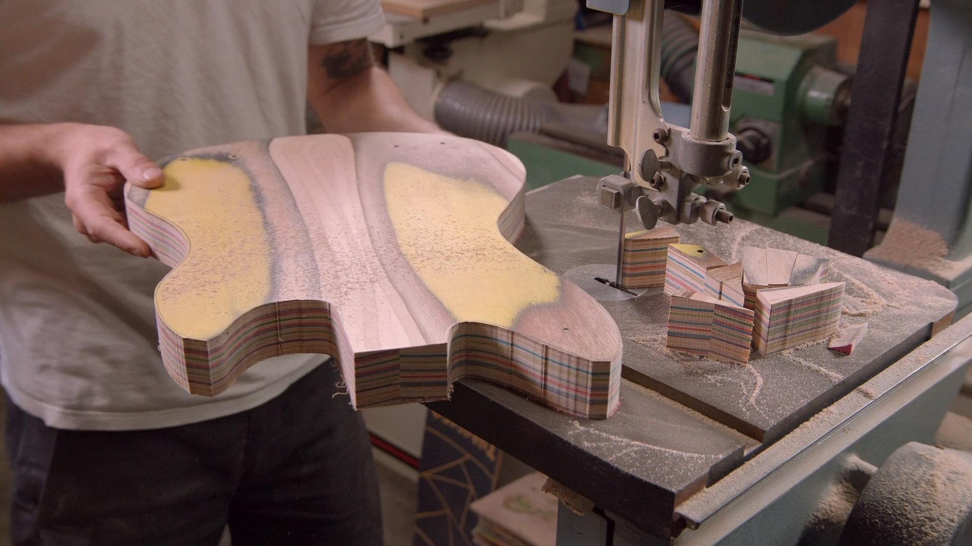 Still from Recycled Skateboard Guitars, Solar Street Lights, Dolls