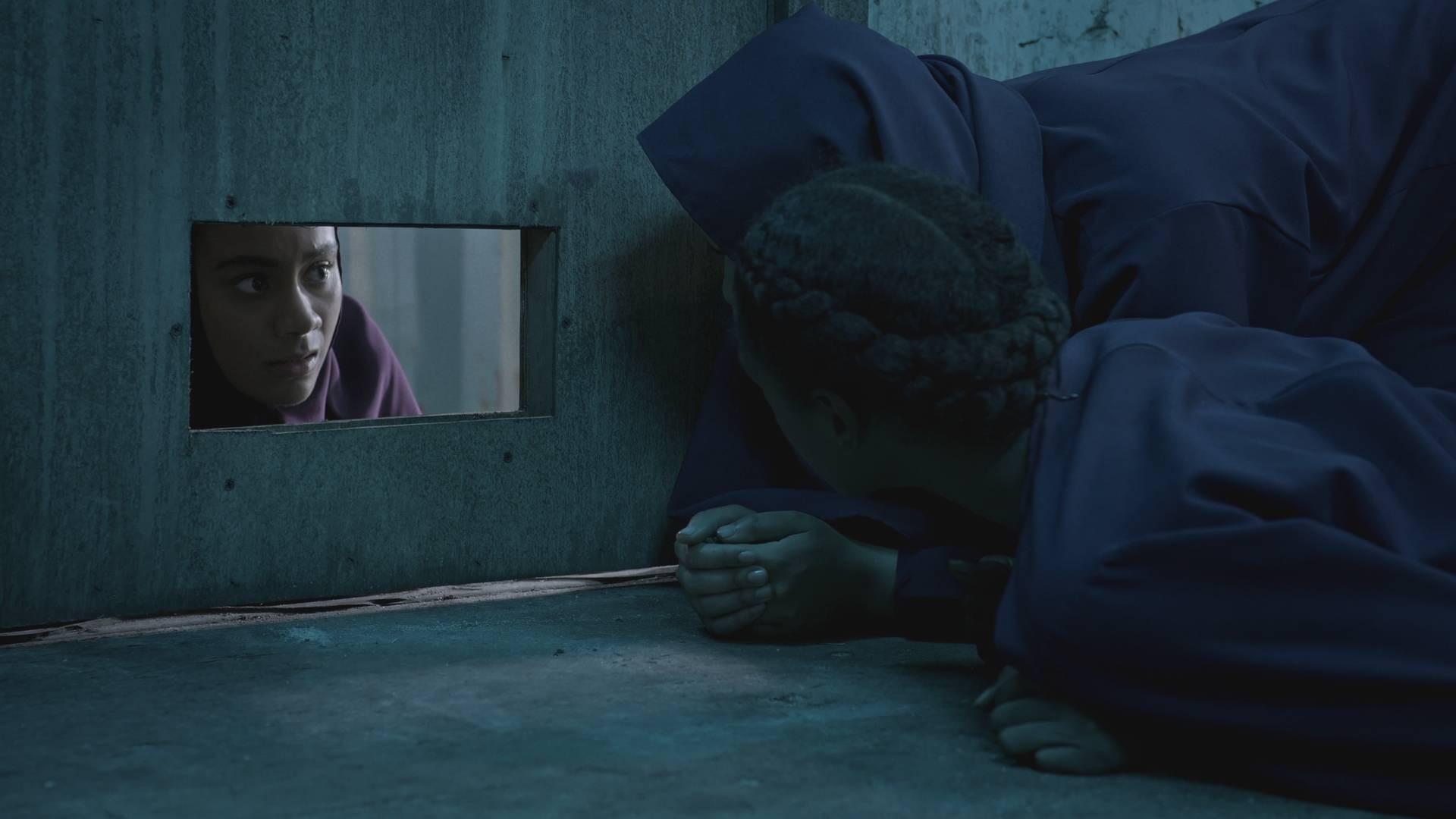 Still from Caged Birds