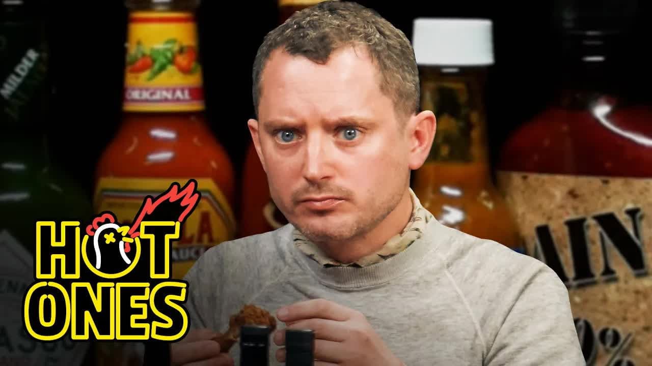 Still from Elijah Wood Tastes the Lava of Mount Doom While Eating Spicy Wings