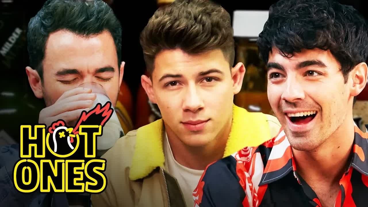 Still from The Jonas Brothers Burn Up While Eating Spicy Wings