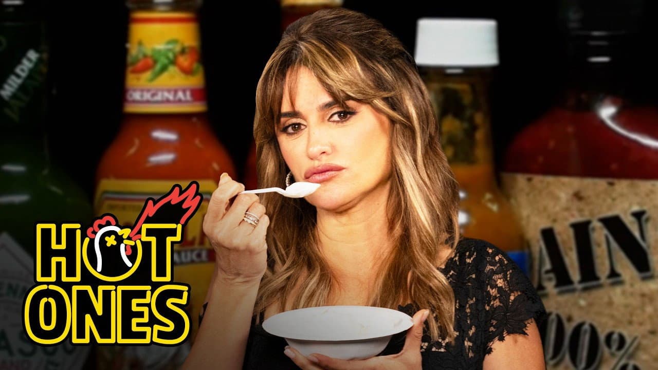 Still from Penélope Cruz Laughs With Abandon While Eating Spicy Wings