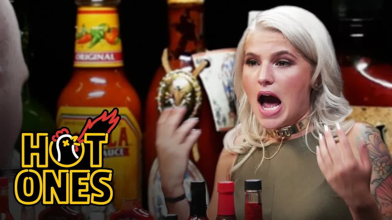 Still from Carly Aquilino Takes On the Spicy Wings Challenge