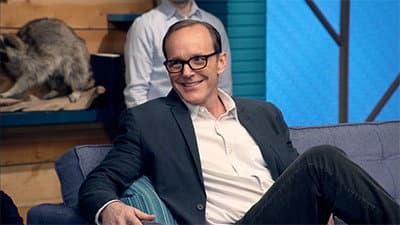 Still from Clark Gregg Wears a Navy Blazer & White Collared Shirt