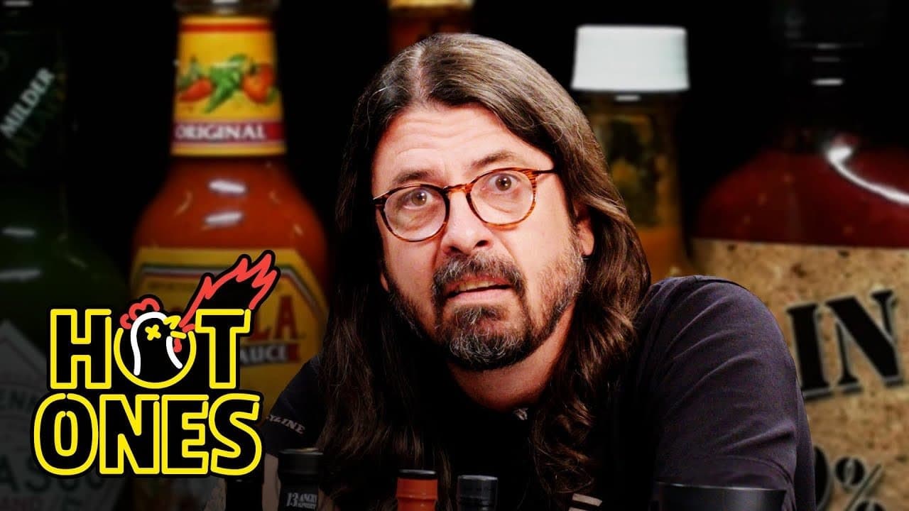 Still from Dave Grohl Makes a New Friend While Eating Spicy Wings