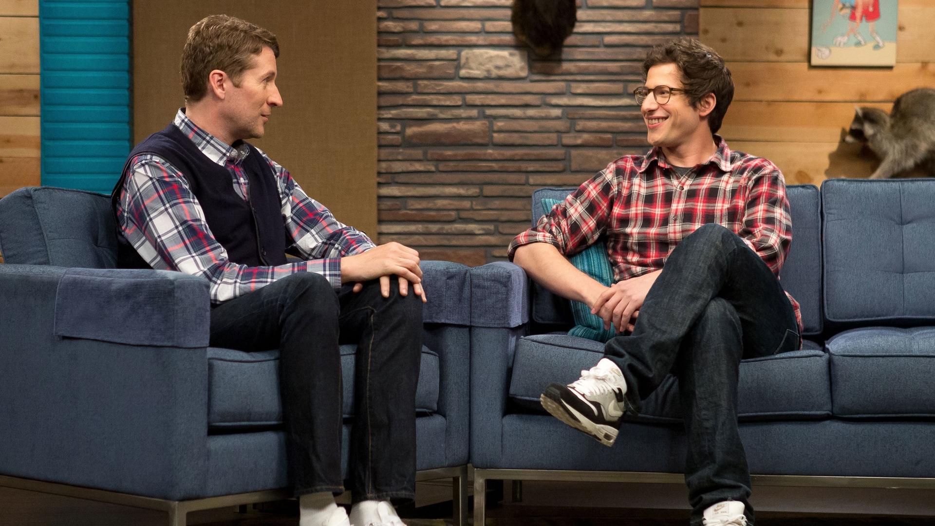 Still from Andy Samberg Wears a Plaid Shirt & Glasses