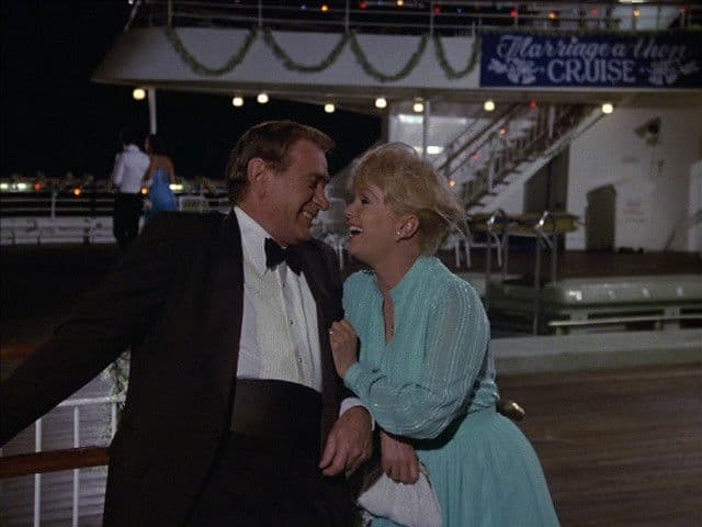 Still from The Promoter/The Judges/The Family Plan/Forever Engaged/May the Best Man Win (2)