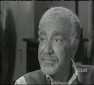 Still from The Case of the Wooden Nickels