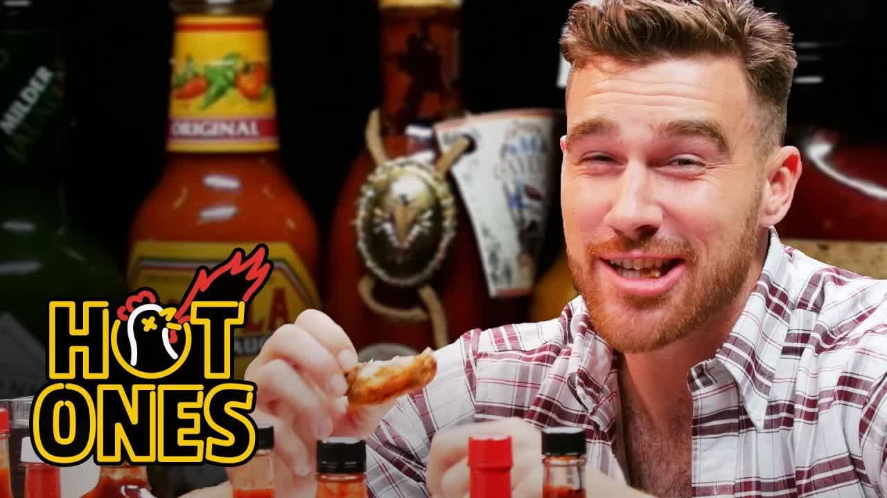 Still from Travis Kelce Gets Woozy Eating Spicy Wings