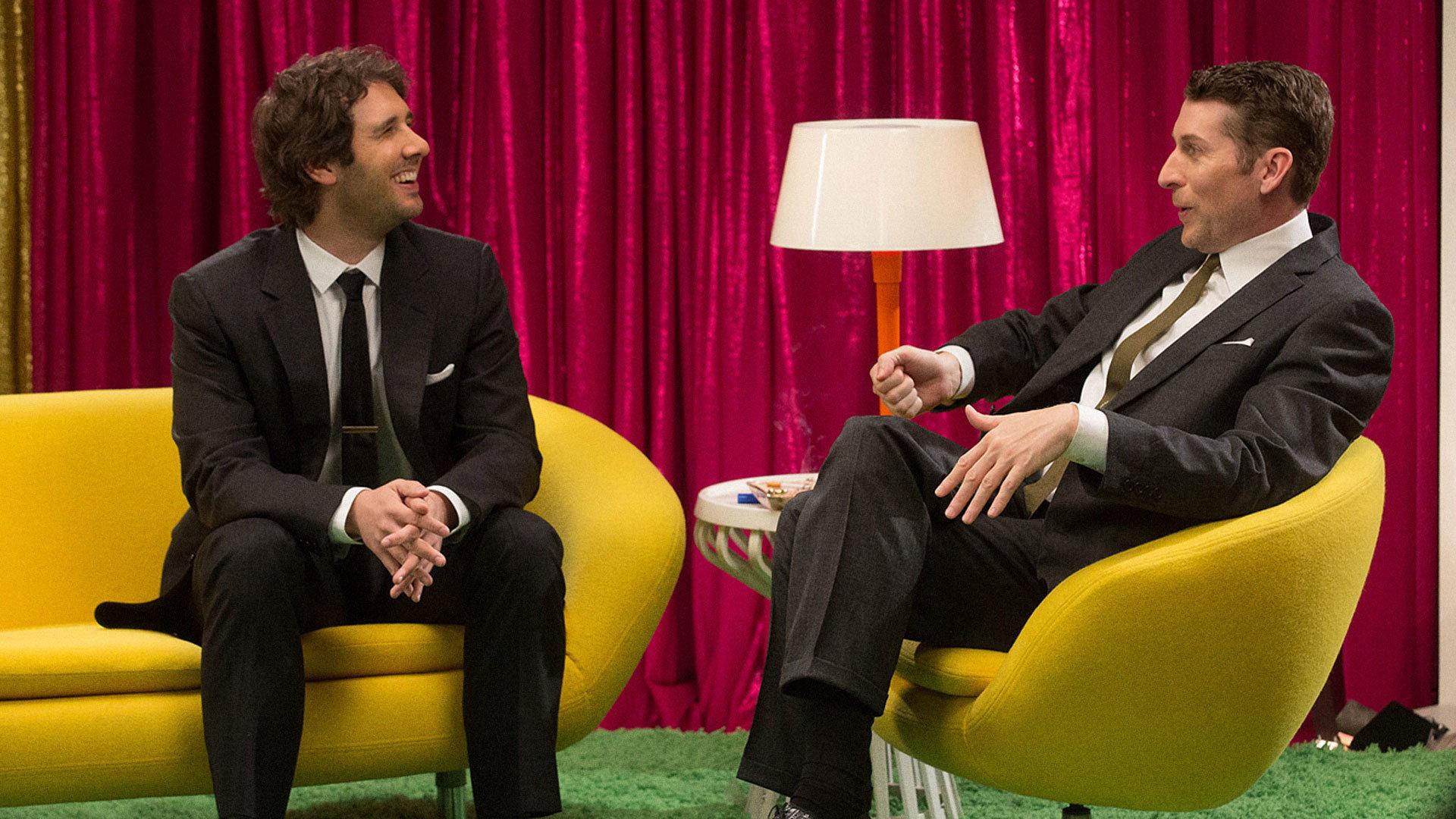 Still from Josh Groban Wears a Suit & Striped Socks