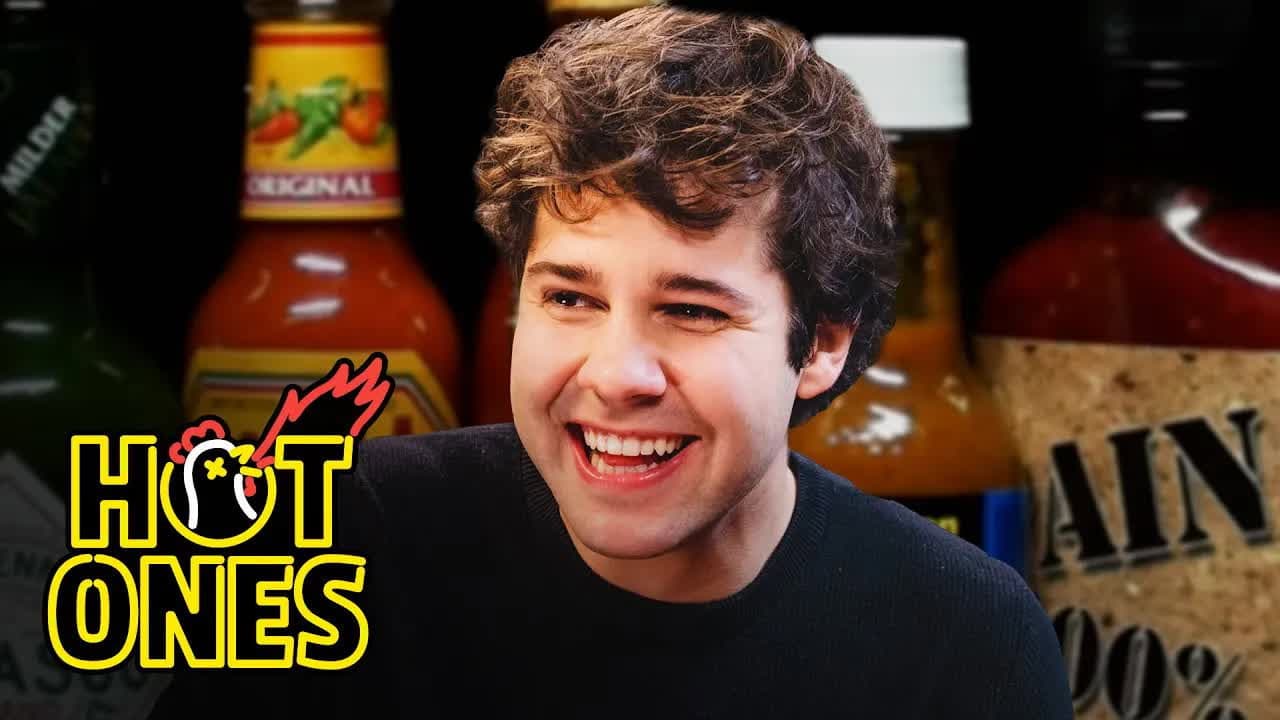 Still from David Dobrik Experiences Real Pain While Eating Spicy Wings
