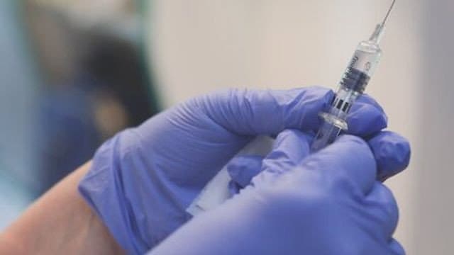 Still from The Race for a Vaccine