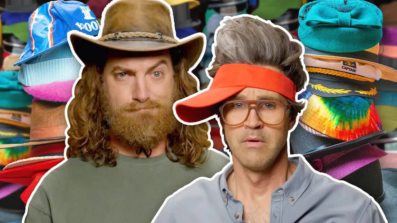 Still from We Try On 37 Different Hats and Slowly Go Mad