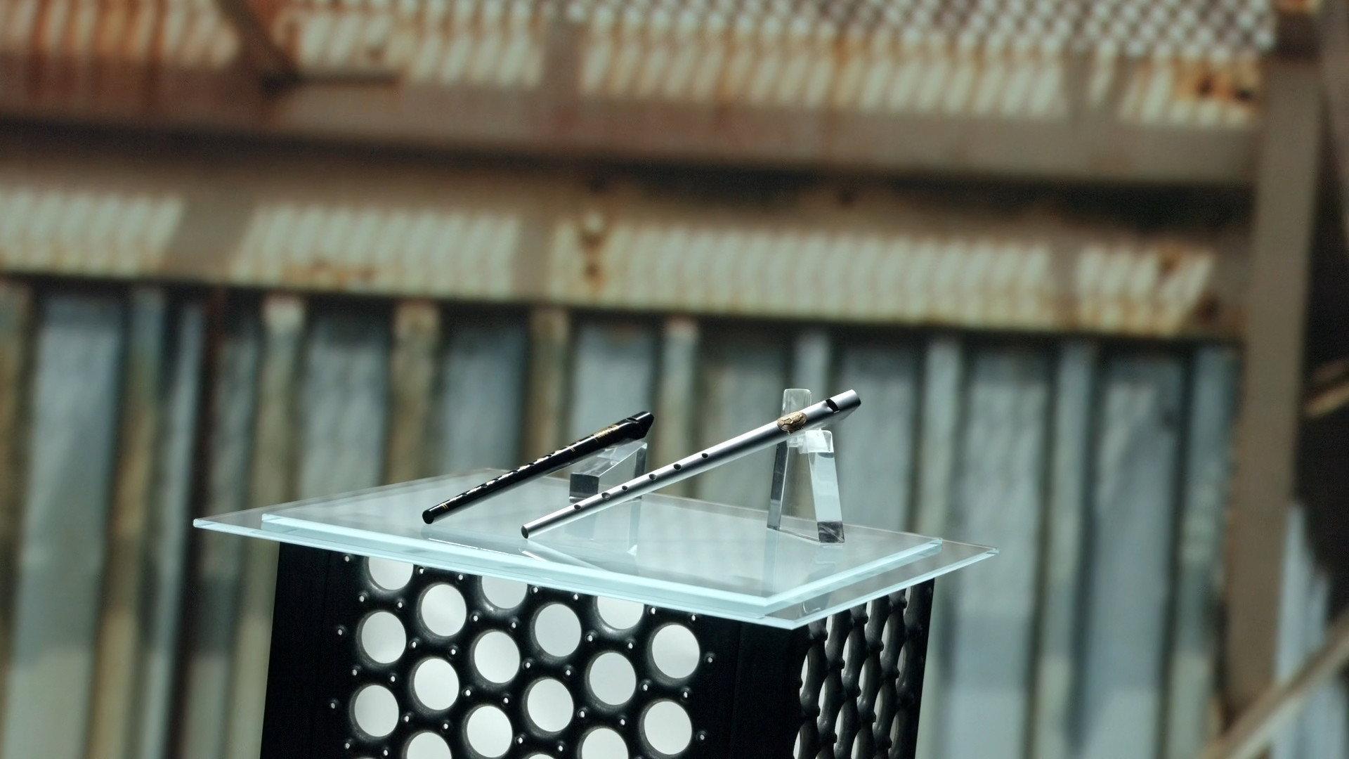 Still from Tin Whistles, Horn Products, Formula F Race Cars