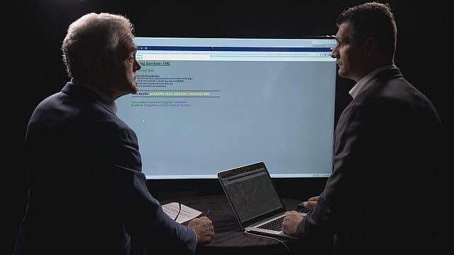 Still from What Happened in Wuhan?, Ransomware, Sir David