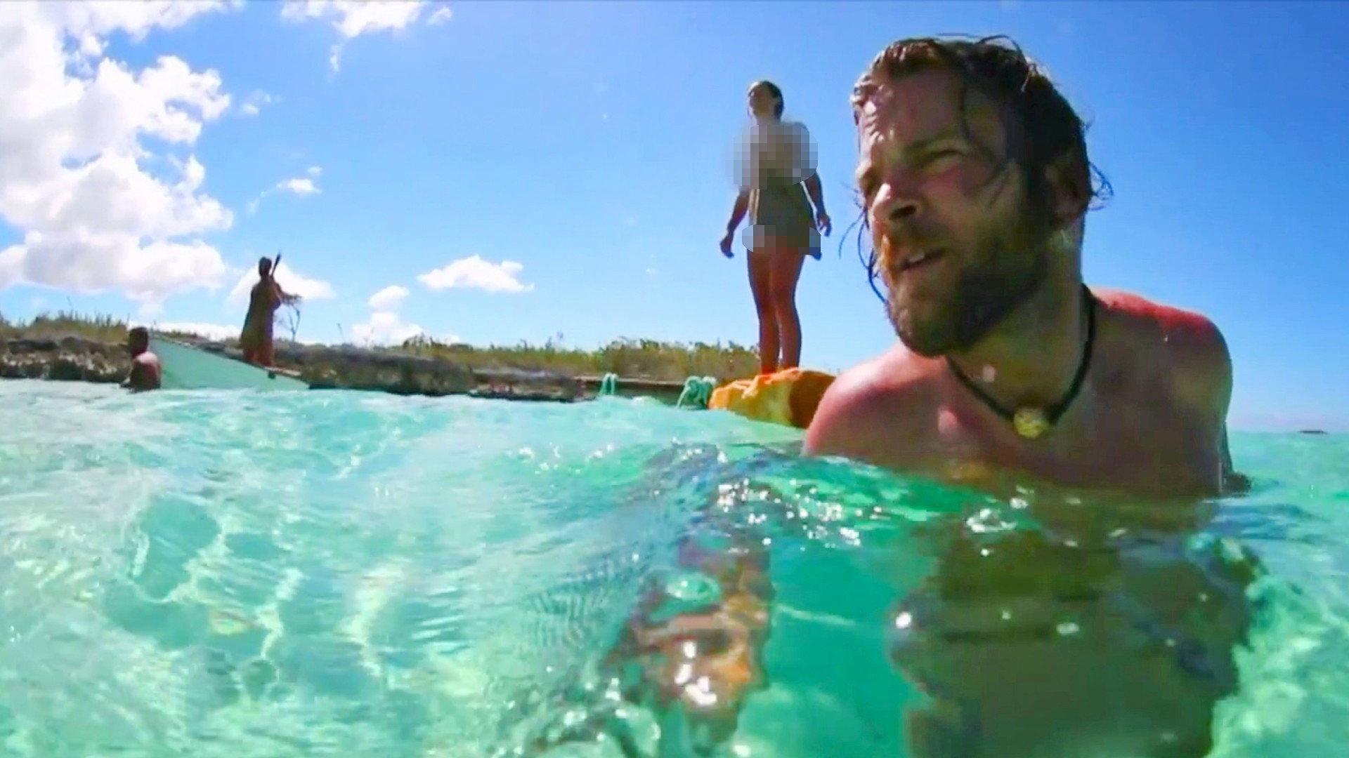 Still from Naked and Afraid of Sharks