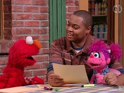 Still from Chris Helps Elmo Write a Letter