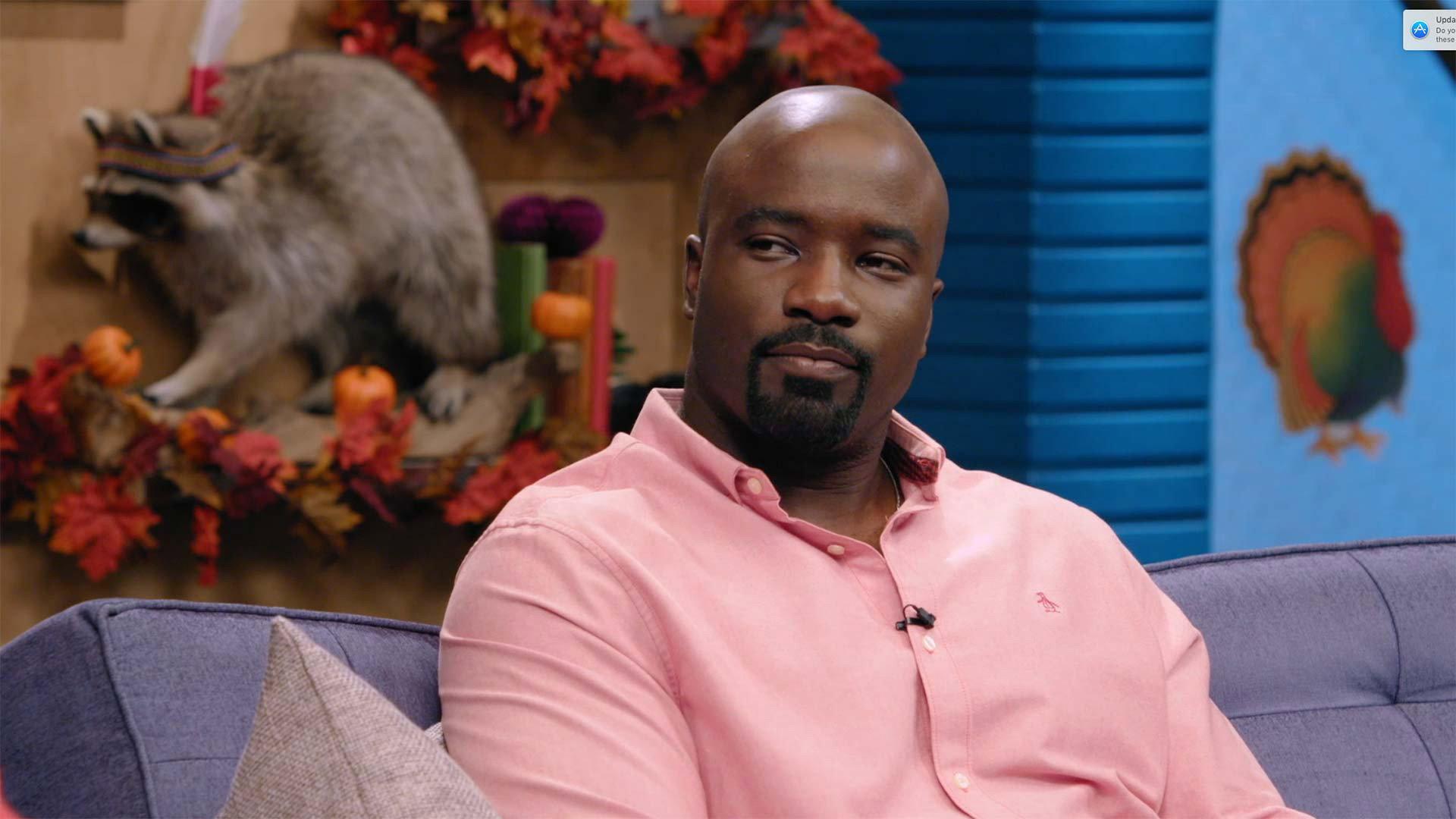 Still from Mike Colter Wears a Pink Button Up and Black Boots