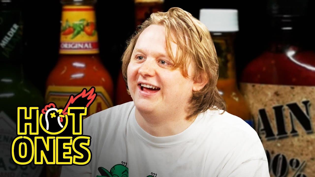 Still from Lewis Capaldi Grasps for a Lifeline While Eating Spicy Wings