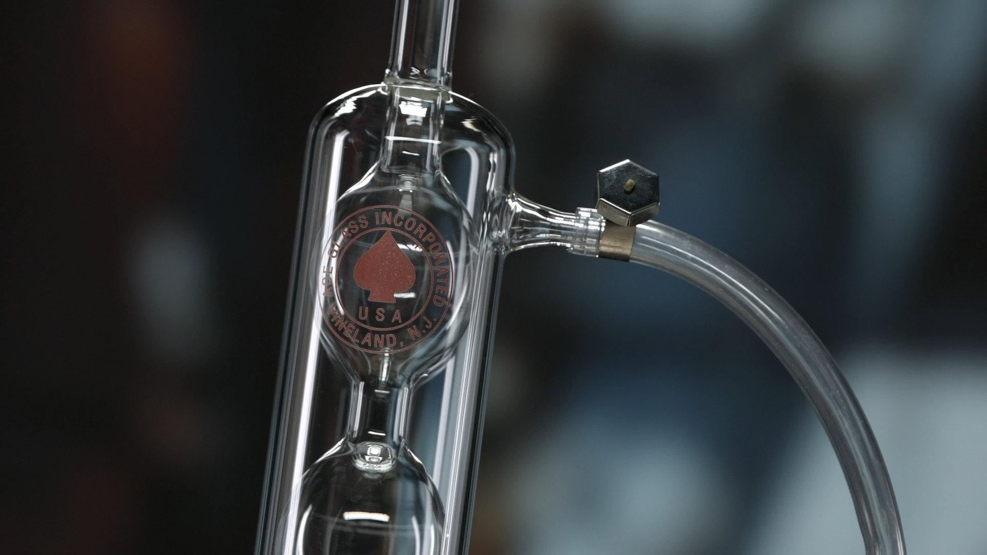 Still from Lab Extractors, Custom-Made Chandeliers, Power Trainers, Coffee Pods
