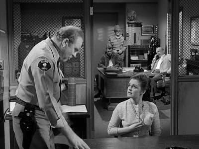 Still from The Case of the Scarlet Scandal