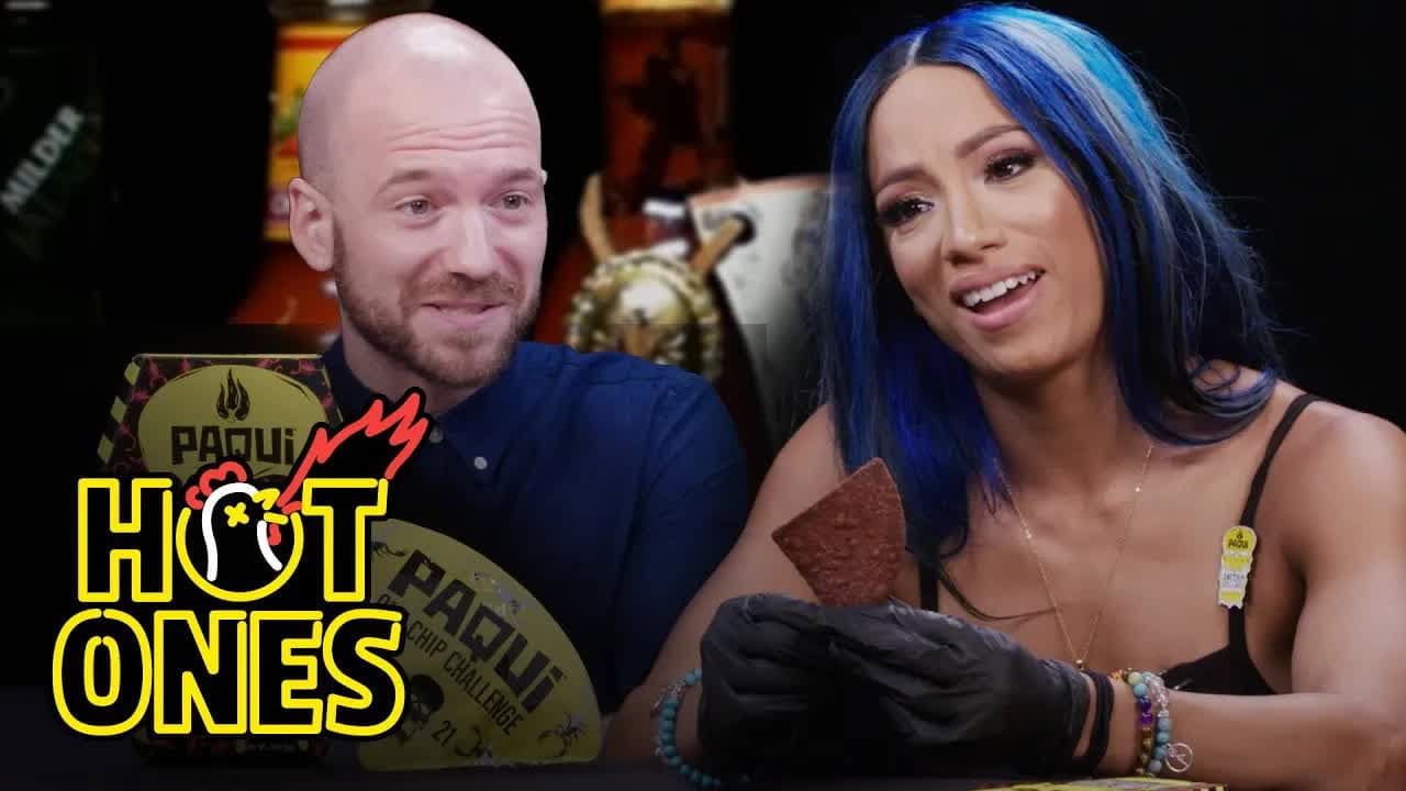 Still from Sean Evans and Sasha Banks Try the Paqui One Chip Challenge