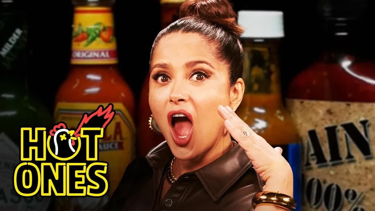 Still from Salma Hayek Adopts Sean Evans While Eating Spicy Wings