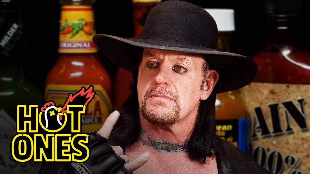 Still from The Undertaker Takes Care of Business While Eating Spicy Wings