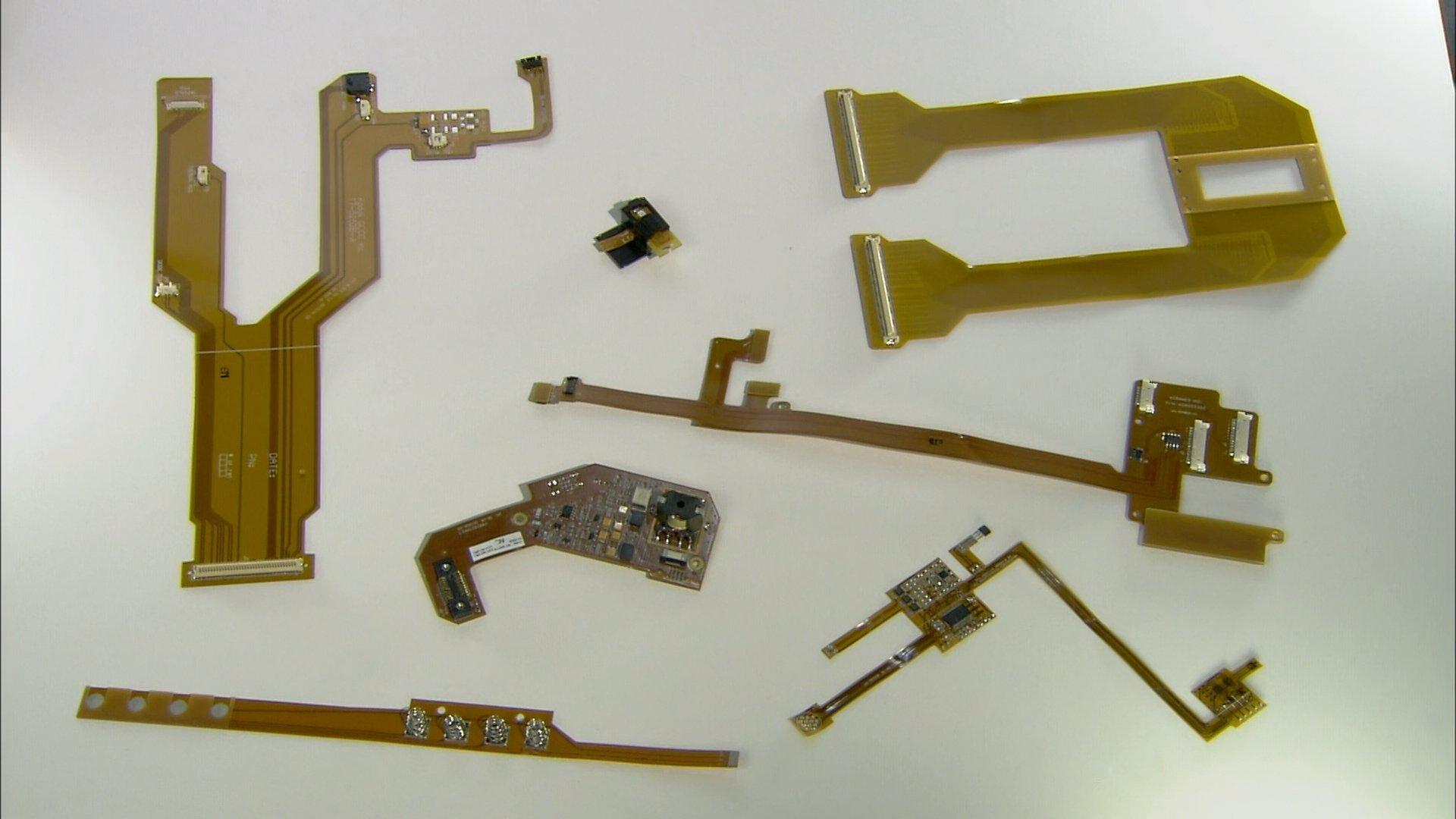 Still from Noise Barrier Walls, Front-Load Washers, Bourbon, Flexible Circuit Boards