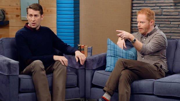 Still from Jesse Tyler Ferguson Wears a Brown Checked Shirt and Stripey Socks