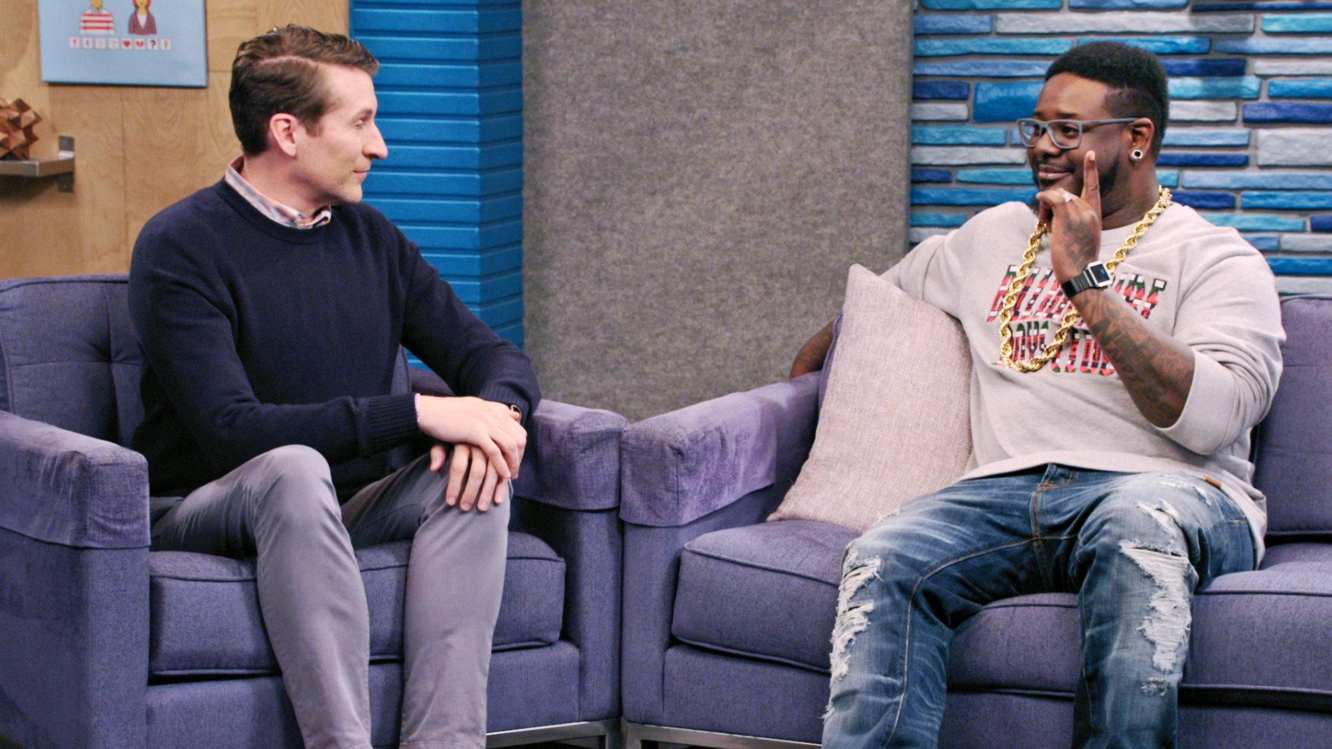 Still from T-Pain Wears Shredded Jeans and a Printed Shirt