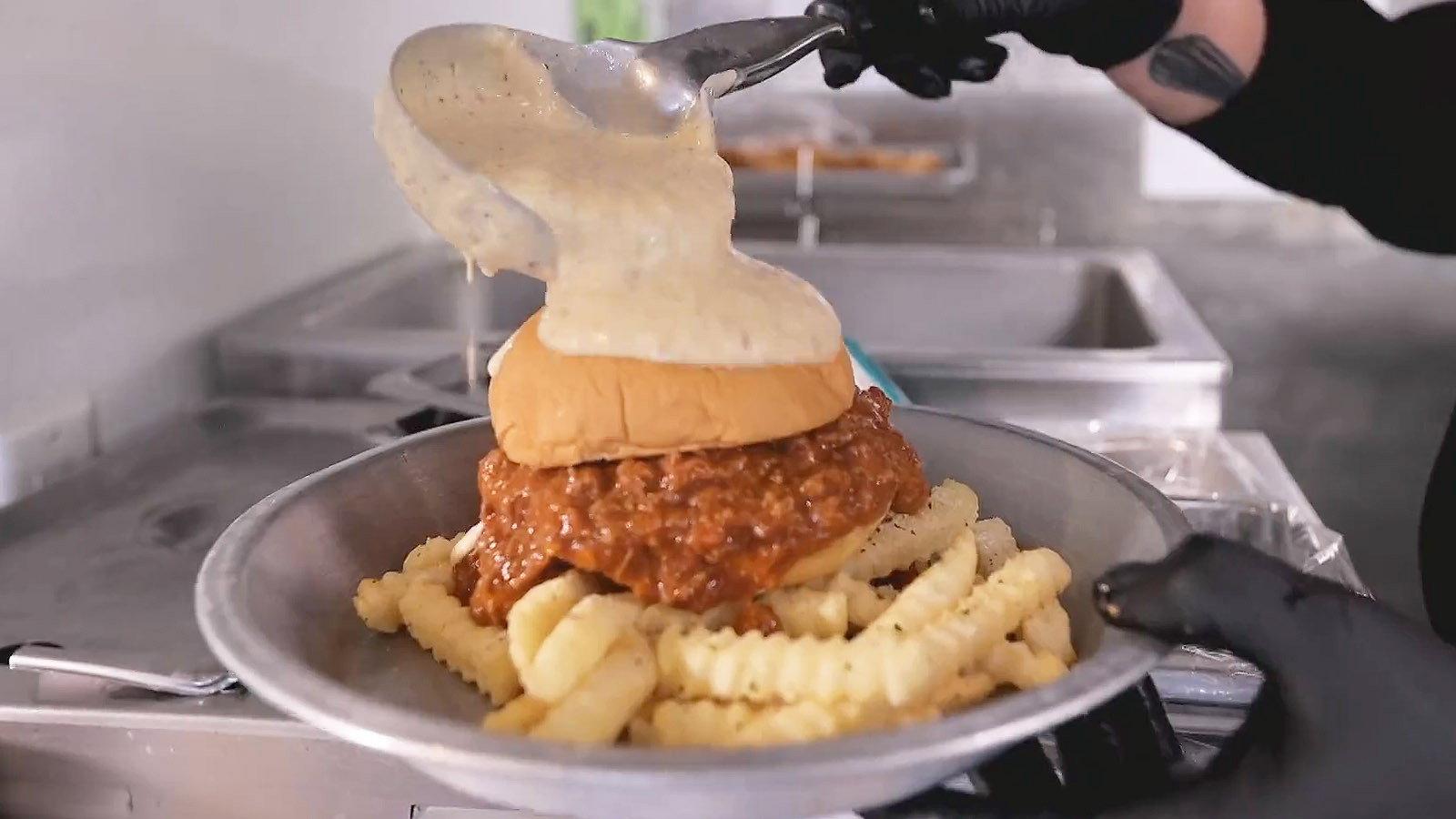Still from Triple D Nation: Smothered and Sauced